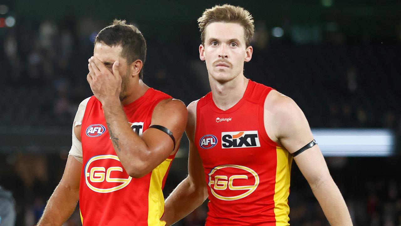 MELBOURNE, AUSTRALIA - APRIL 08: Ben Long (left) and Noah Anderson of the Suns look dejected after a loss during the 2023 AFL Round 04 match between the St Kilda Saints and the Gold Coast Suns at Marvel Stadium on April 8, 2023 in Melbourne, Australia. (Photo by Michael Willson/AFL Photos via Getty Images)