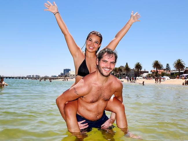 Jessica Robson and Joe Koz took a dip at South Melbourne beach. Picture: Ian Currie