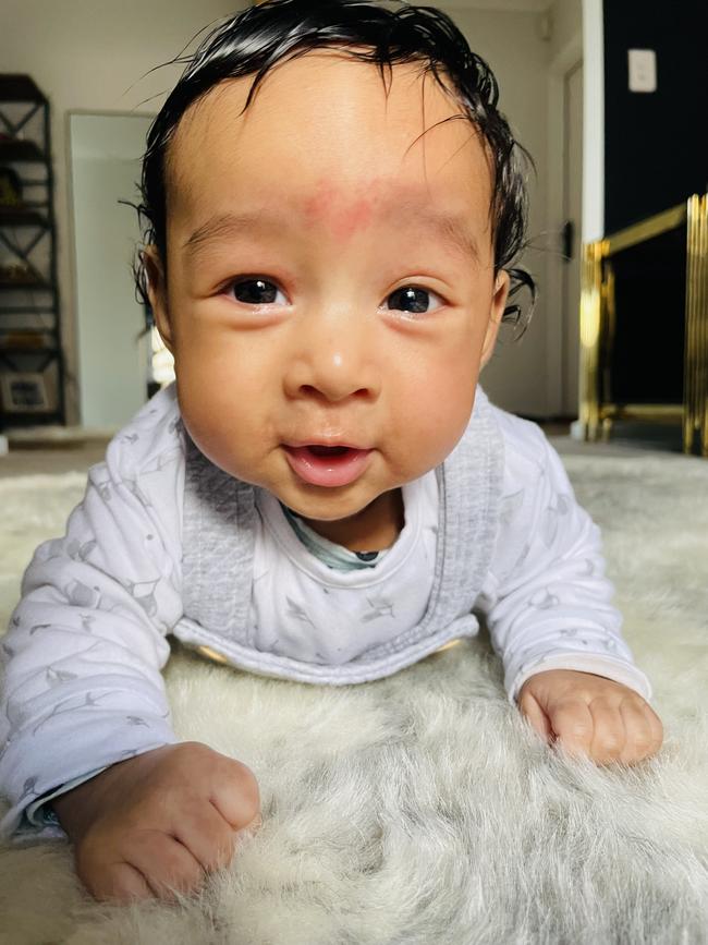 Yunav GC, four months old. Very happy baby. Likes to smile and talk.