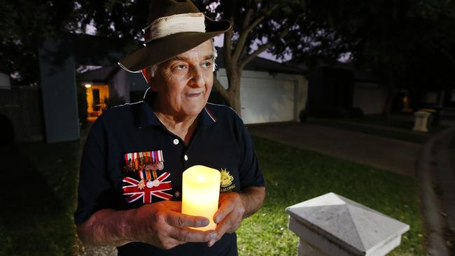 WWII veteran William Doughty outside his house with his grandchildren for ANZAC DAY. Picture: David Caird