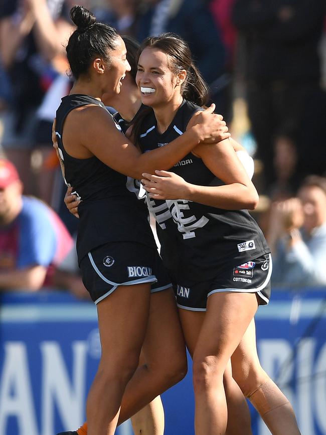 Darcy Vescio, Brooke Walker and Chloe Dalton of the Blues celebrate a goal. Picture: Quinn Rooney/Getty Images.