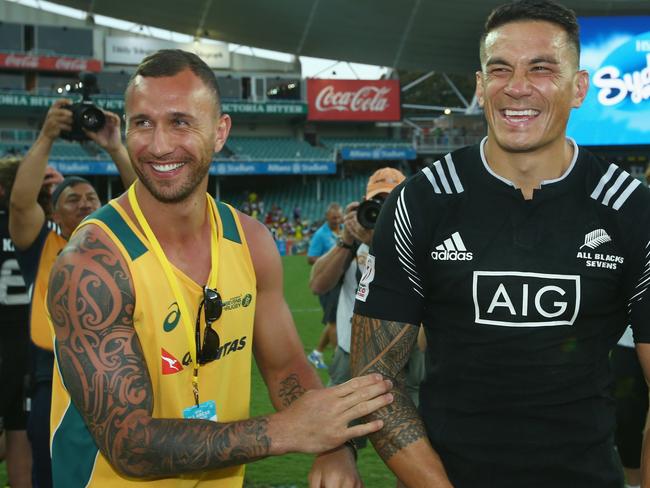 SYDNEY, AUSTRALIA - FEBRUARY 07: Quade Cooper of Australia and Sonny Bill Williams of New Zealand share a laugh after the 2016 Sydney Sevens cup final match between Australia and New Zealand at Allianz Stadium on February 7, 2016 in Sydney, Australia. (Photo by Mark Kolbe/Getty Images)