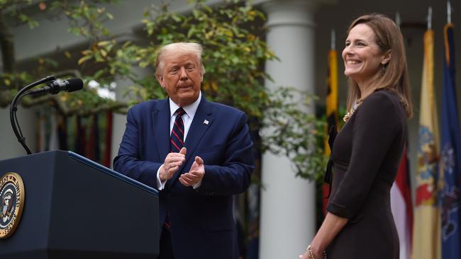 US President Donald Trump announces his US Supreme Court nominee, Judge Amy Coney Barrett (R), in the Rose Garden.