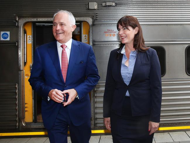 Prime Minister Malcolm Turnbull arriving at Gosford Station today on the train from Sydney.Turnbull is greeted by local member Lucy Wicks. Pic: Sue Graham/AAP Image