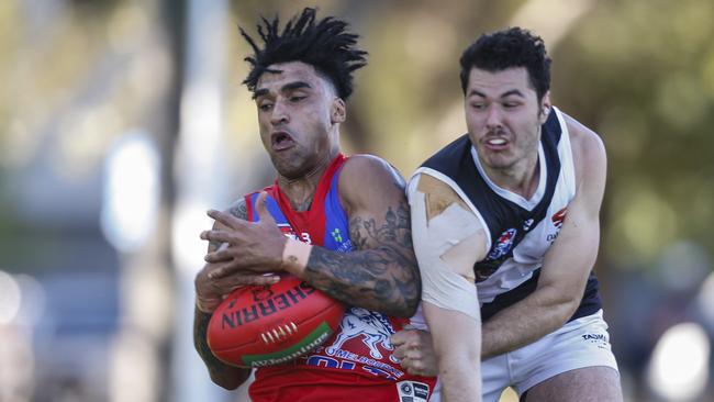 Port Melbourne Colts star Kwane McHarg on the burst against Oakleigh District.