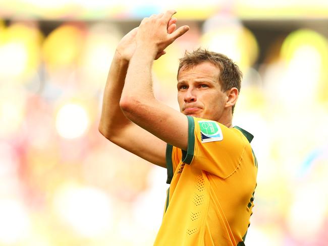 Alex Wilkinson will replace suspended Socceroo Matthew Spiranovic.