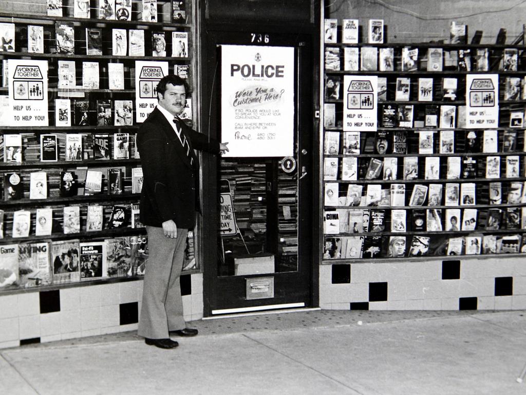 A homicide squad detective outside the Thornbury bookshop.