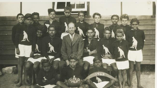 Headmaster Noel White, centre, with Stolen Generation children at Carrolup Native Settlement in WA in 1948.