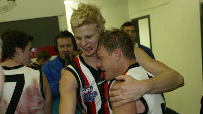 St Kilda greats Nick Riewoldt and Burke embrace after the veteran’s last game.