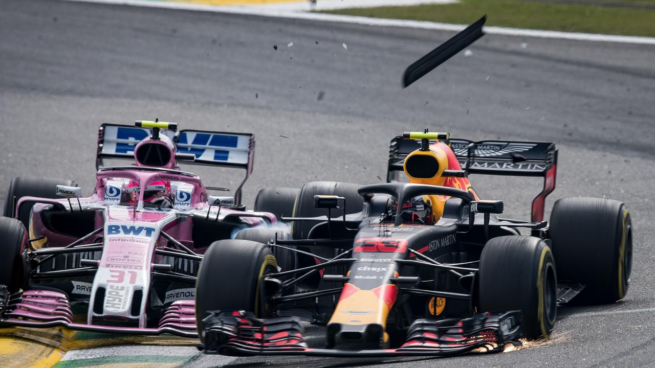 Max Verstappen and Esteban Ocon collide. (Photo by Lars Baron/Getty Images)