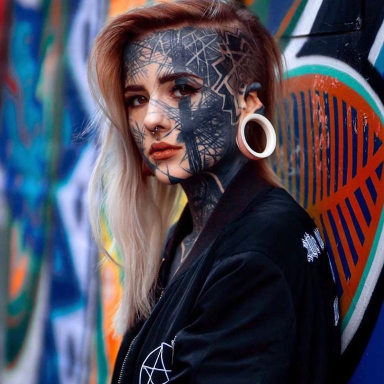 Woman covers 98% of her body with 1,000 tattoos and reveals where