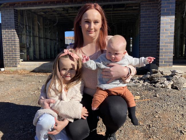 Skylah, Sam and Archie Lee outside the currently under-construction Hair Colour Chick site in Dubbo. Picture: Ryan Young