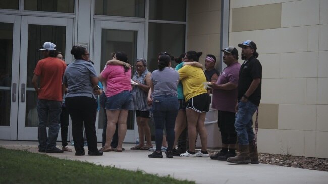 Family and friends rushed to the scene after hearing about the shooting. Picture: Eric Thayer/Bloomberg via Getty Images