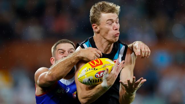 Marshall marks ahead of Josh Bruce. Picture: Getty Images