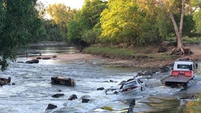 Cars in the drink at Cahills Crossing on Wednesday. PIC: Dan Leather