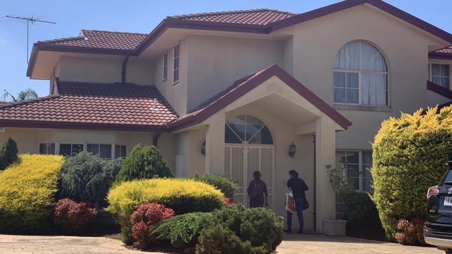 Friends of Vasko Ristevski’s arrive at his Hoppers Crossing home on Thursday afternoon. Picture: Alanah Frost