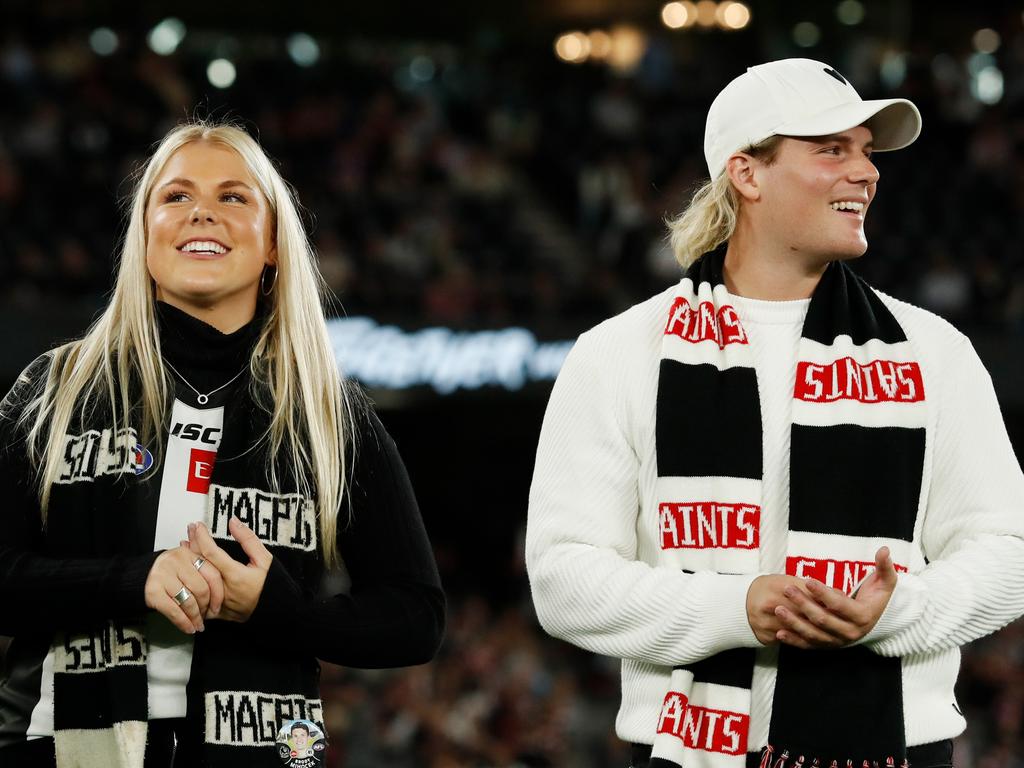 The siblings put on a brave face in the toughest of times. Picture: Dylan Burns/AFL Photos via Getty Images