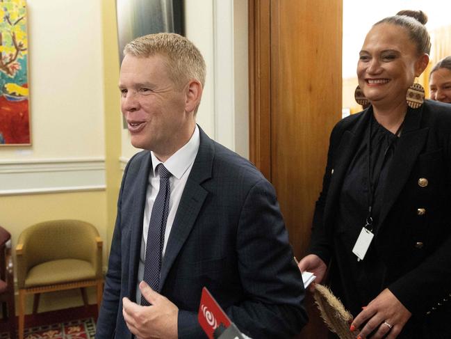 Chris Hipkins and Social Development Minister Carmel Sepuloni leave the Labour caucus meeting. Picture: AFP