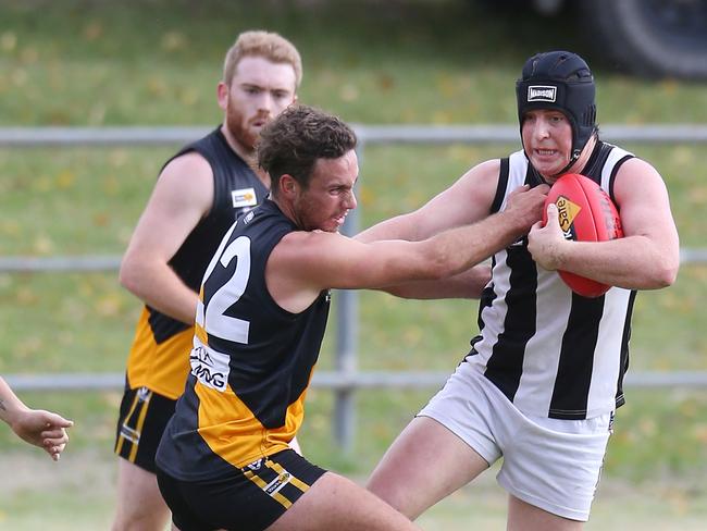 Ellinbank & District FL, Round 6,  Lang Lang Tigers V  Poowong Magpies, at Lang Lang,  Jack Brickwood, 22,  Lang Lang Tigers   &  Jack Hazendonk, 20, Poowong Magpies,   Picture Yuri Kouzmin