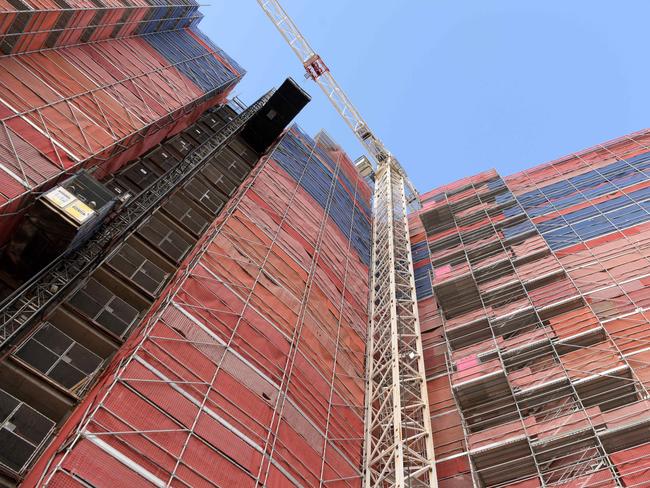 The scaffolding is set to come down on the 16-storey apartment complex. (AAPImage/Tracey Nearmy)