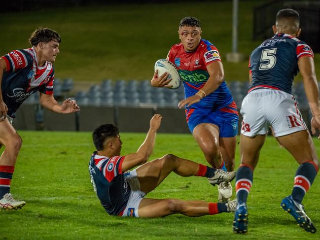 Jermaine McEwen powers through the defence. Picture: Thomas Lisson