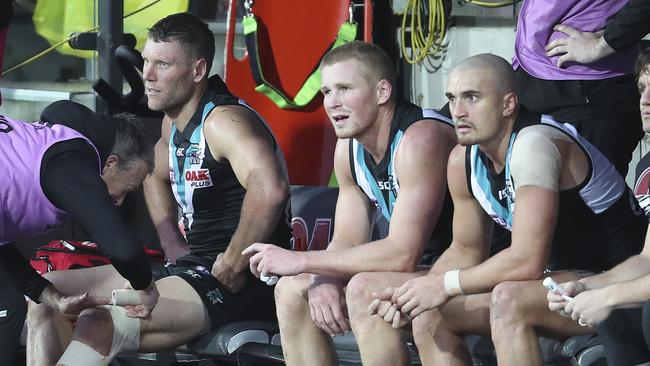 Brad Ebert after hurting his knee against Brisbane. Picture: Sarah Reed.