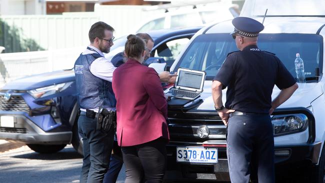 Police at the scene of the woman’s death at Redwood Park on Thursday. Picture: Brett Hartwig.