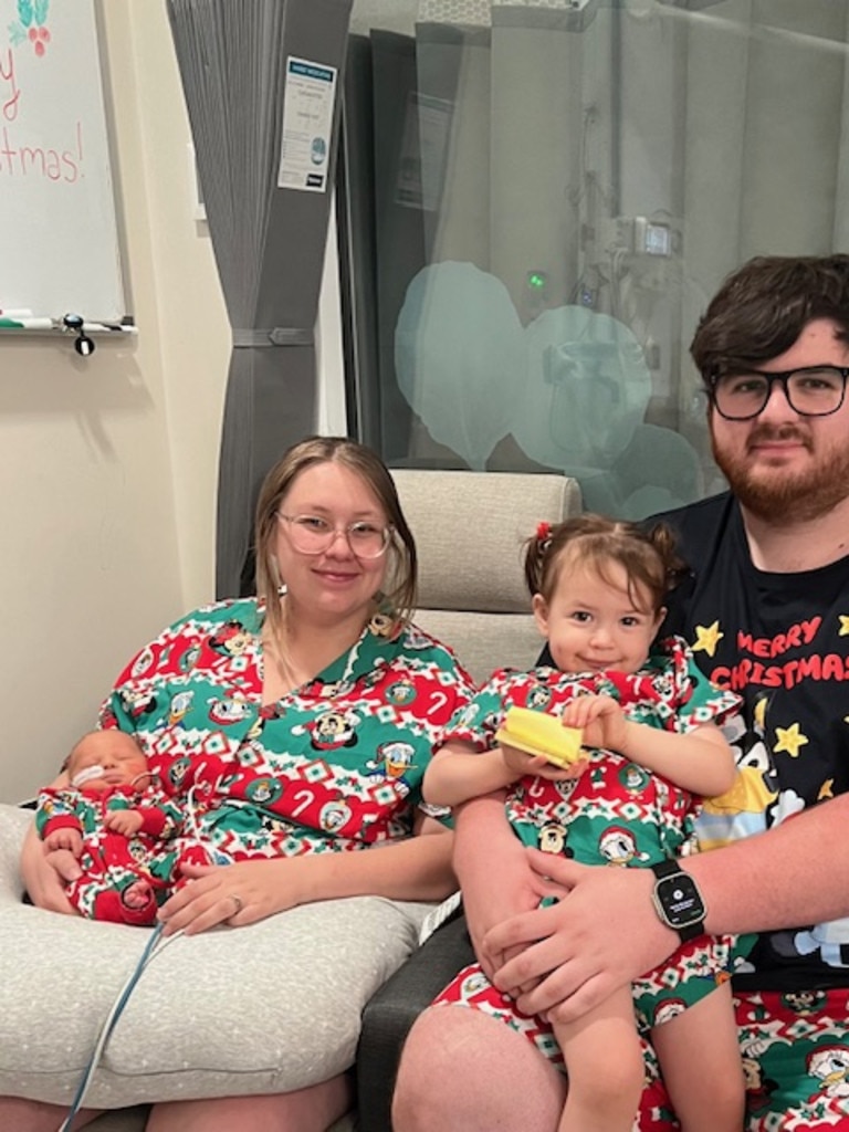 Baby Remi with his older sister, two-year-old Darcy and parents Caitlin Dann and Angus Grant. Picture: Supplied by family