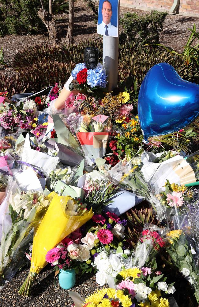 Flowers and messages left for 53-year-old senior constable David Masters who was killed deploying road spikes, Deception Bay Police Station. Picture: Liam Kidston