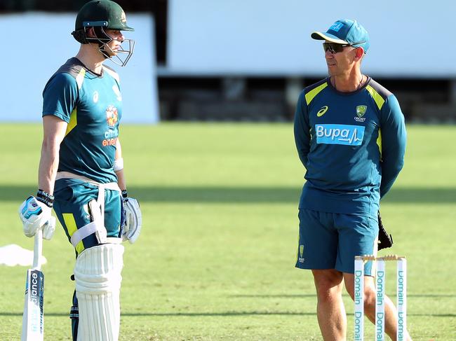 Australian coach Justin Langer says Steve Smith (left) could be considered for a vice- captaincy role once his leadership ban expires. Picture: AAP