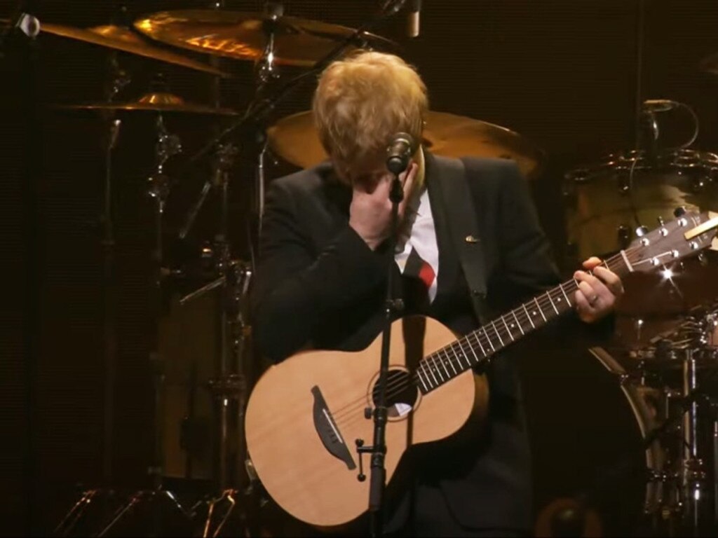 Ed Sheeran plays a newly written song, Visiting Hours, at Michael Gudinski's memorial service.