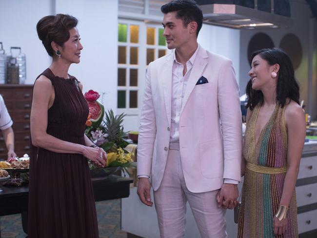 Michelle Yeoh with Henry Golding and Constance Wu in a scene from Crazy Rich Asians. Picture: Sanja Bucko/Warner Bros