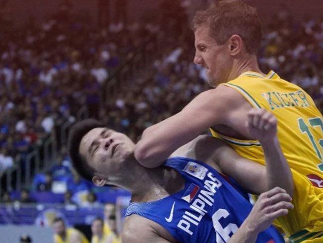 Daniel Kickert elbows Roger Pogoy of the Philippines. Picture: Supplied/ FIBA Telecast