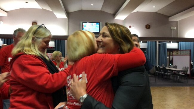 Labor candidate for Gilmore Fiona Phillips is congratulated by supporters.