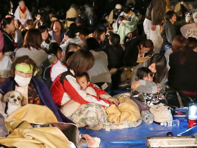 Residents shelter after the earthquake forced evacuations. Picture: AP