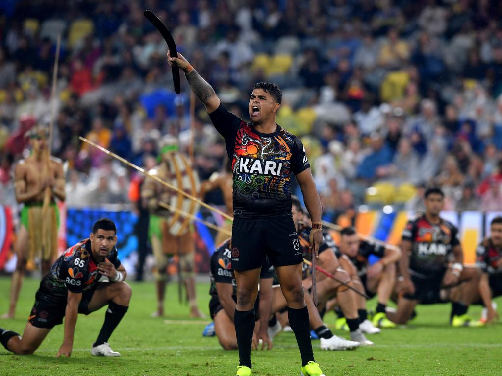 Latrell Mitchell has more talent than most footy players in Australia, and has become a leader for Indigenous issues by calling out racist abuse. Here is he representing the Indigenous All-Stars, leading the charge in a pre-match ritual to celebrate his culture. Full of passion, Mitchell is watched on by his teammates in the background. Picture: Evan Morgan.