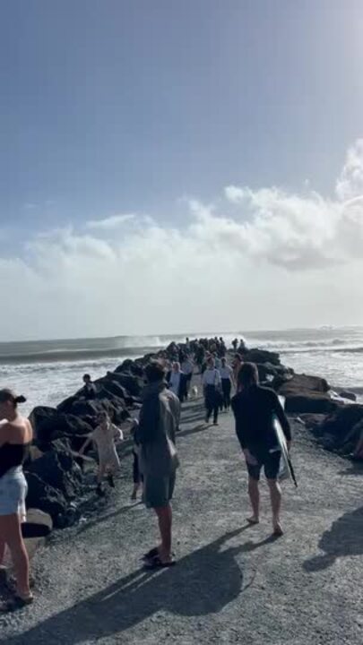 Crowds at Currumbin ahead of Tropical Cyclone Alfred