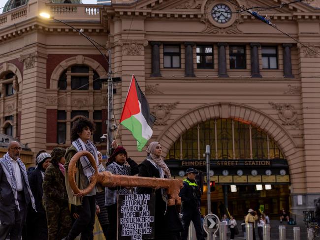 Pro Palestine anti Israel Protesters gather at the Shrine of Remembrance and walk to Flinders street station on the anniversary of the October 7th Terrorist attack in Israel. Picture: Jason Edwards