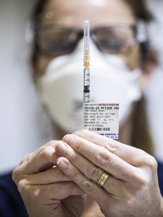 A Pfizer vaccine dose is prepared in the Melbourne Showgrounds on Tuesday. Picture: Getty Images