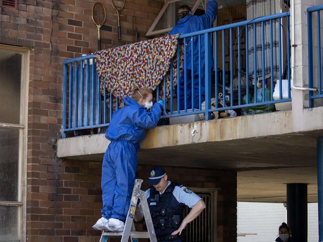 NSW Police Forensics Unit dusting for prints at the apartment after Ms Gilbert was found dead. Mr Gilbert found her body. Picture: Dylan Coker