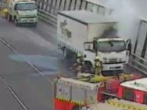 A truck fire on a major Melbourne freeway has caused traffic to come to a standstill, causing more than 30 minutes of delays. Picture: Supplied/VicTraffic