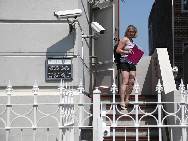 A woman leaves the Russian consulate  in San Francisco, California. In response to a Russian government demand for the United States to cut its diplomatic staff in Russia by 455, the Trump administration ordered the closure of three consular offices in the San Francisco, New York and Washington. Picture: AFP