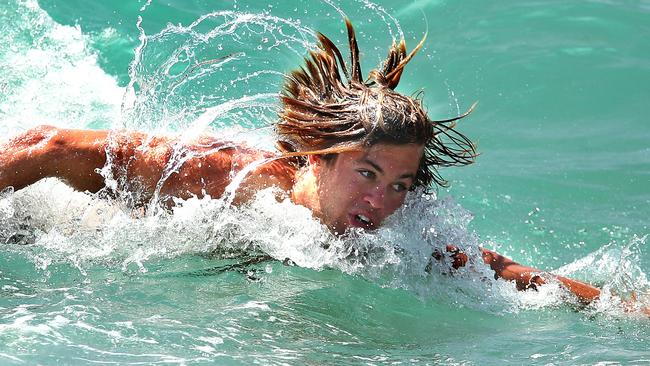 James Rowbottom takes a dip at a Swans recovery beach session at South Maroubra beach. Picture: Phil Hillyard