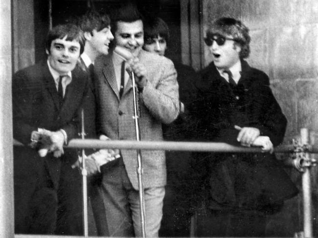 British pop band The Beatles with radio announcer Bob Francis in Adelaide on June 12, 1964. File photo.