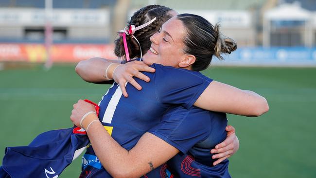 Chaplin (right) presented Delany Madigan with her first Melbourne jumper earlier this month when the Demons met Carlton at Ikon Park. Picture: Dylan Burns / Getty Images