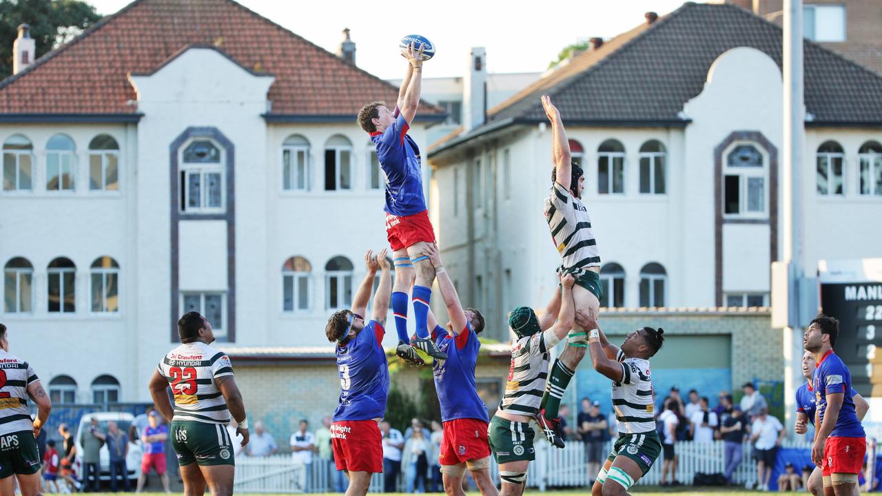 Manly Marlins in action against Warringah Rats.