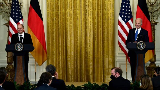 Joe Biden and German Chancellor Olaf Scholz hold a joint press conference in the East Room of the White House in Washington. Picture: AFP.