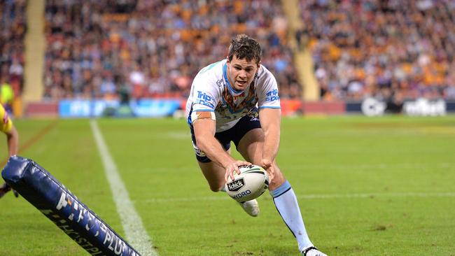 Former Grafton Ghosts flyer Anthony Don scores a try for the Gold Coast Titans during the round 10 NRL upset against the Melbourne Storm at Suncorp Stadium.