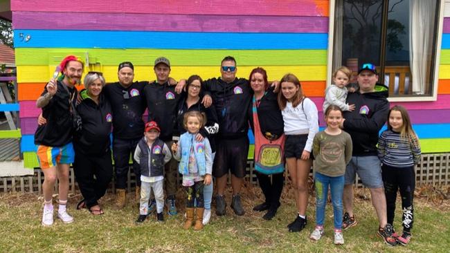 Mykey O'Halloran and members of the community at his rainbow house. Picture: Supplied