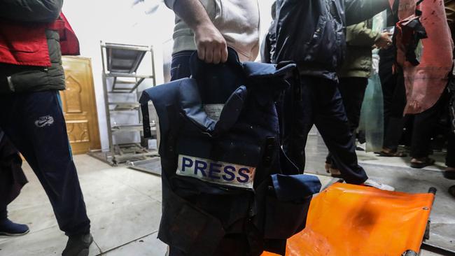 The press jacket of Al Jazeera TV cameraman Samer Abu Daqqa, who was killed while working in an airstrike. Picture: Getty Images